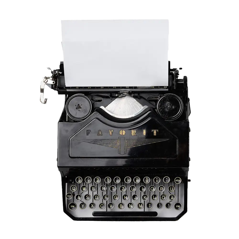Vitange typewriter from top view with a blank sheet of paper rolled into the barrel