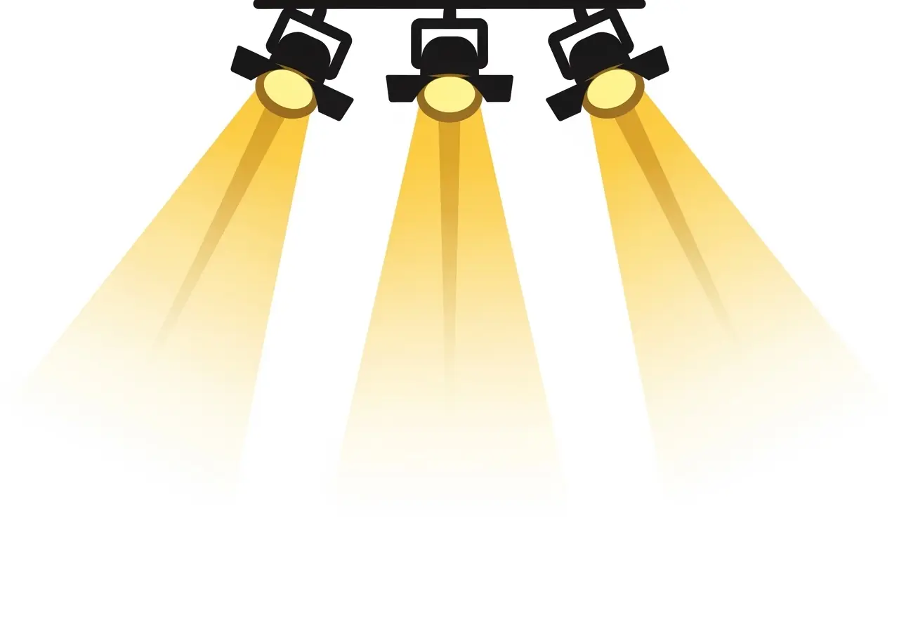 Three stage lights shining down gold light